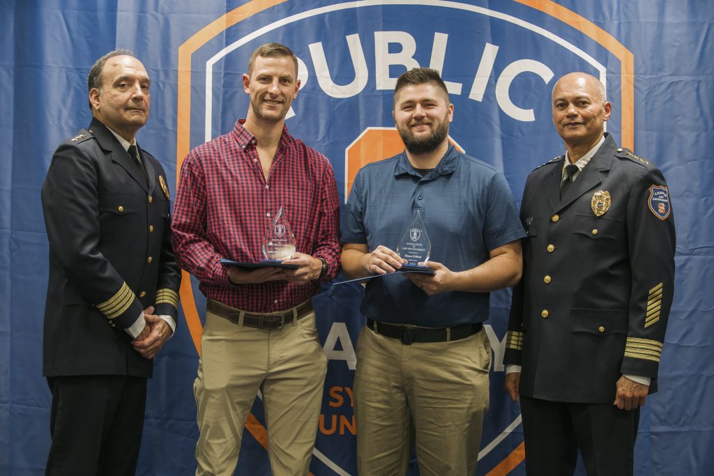 John and Simon accepting their award