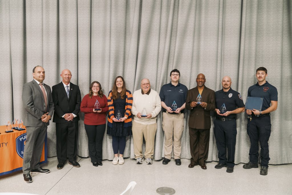 From Left to Right: Deputy Chief John Sardino, Chief Mike Bunker, Kiana Racha, Courtney Albiker, Donald Plantz, Richard Curran, Larry Whitlock, Andrew Kratz and Adam Cox