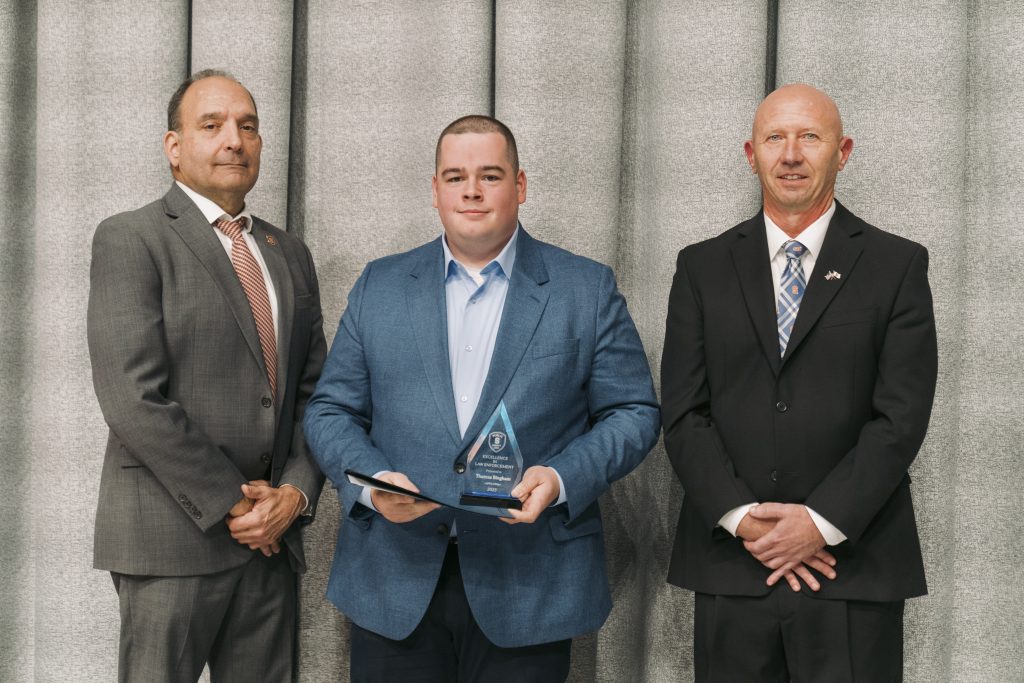 From Left to Right: Deputy Chief John Sardino, Thomas Bingham and Chief Mike Bunker