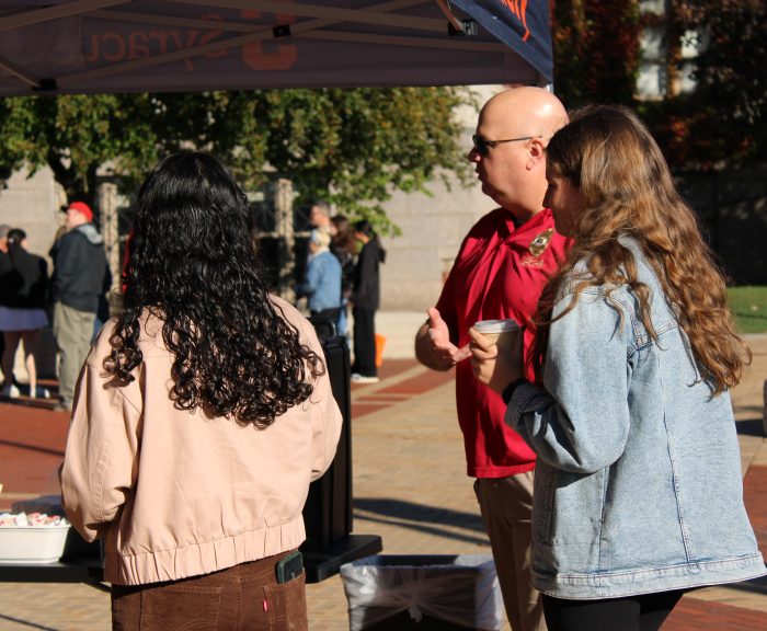 DPS Student Employee Alexa talks to Sergeant John Stephens during Coffee with a Cop