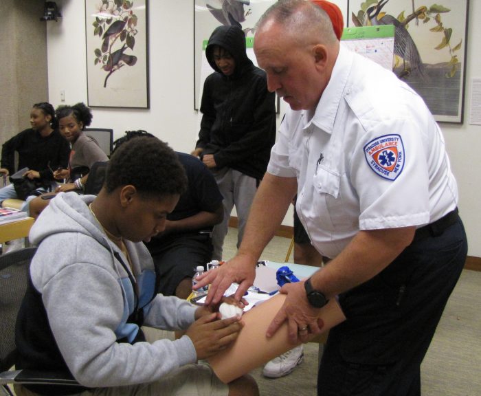SUA Paul Smyth helps show how to stop the bleed